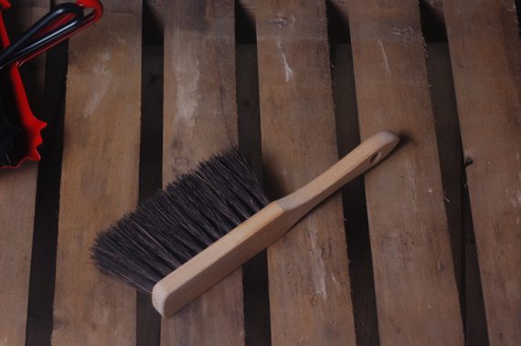 Stiff hand brush