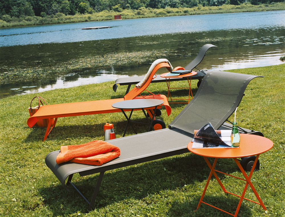Dune sunloungers in Carrot (& Savanna - discontinued) with Tom Pouce side table in Carrot