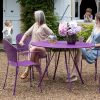 Rendez-Vous table and armchairs in Aubergine