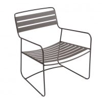 Surprising low armchair in Russet