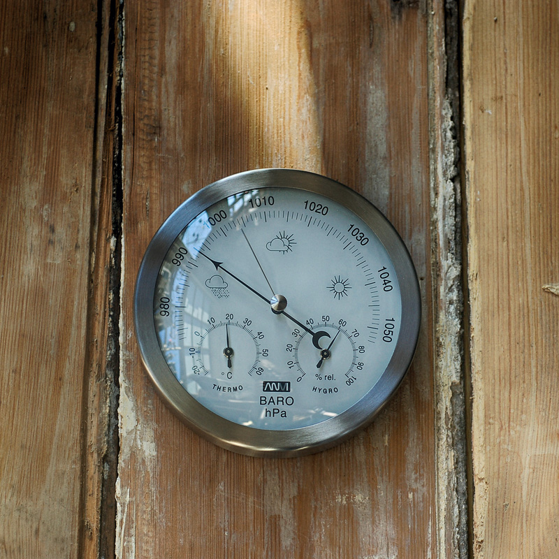 Small brushed stainless steel barometer with temperature and hydration