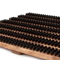 Wood and brush doormat in brown