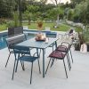 Monceau table and Monceau armchairs in Acapulco Blue, Monceau bench and Monceau armchairs in Anthracite