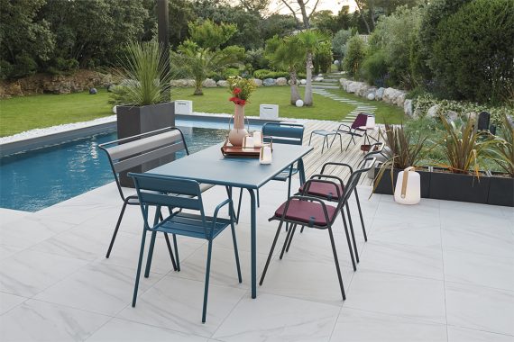 Monceau table and Monceau armchairs in Acapulco Blue, Monceau bench and Monceau armchairs in Anthracite