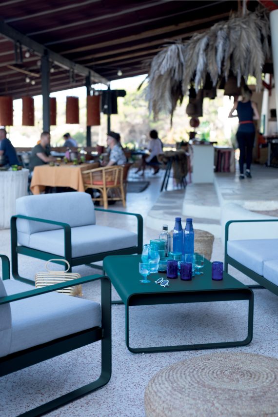 Bellevie low table, armchairs and two seat sofa in Acapulco Blue