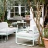 Bellevie sofa and armchair, Cocotte side table and Luxembourg drinks trolley in Ice Mint