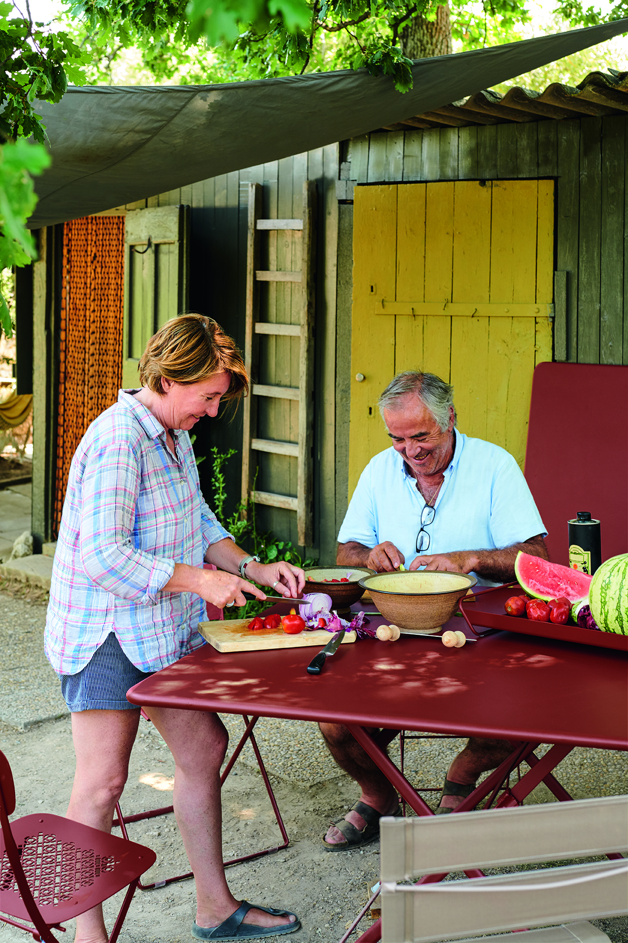 Caractère table and Lorette folding chairs