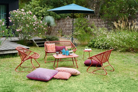 Sixties armchairs, bench and low table, Cocotte side table, all in Red Ochre