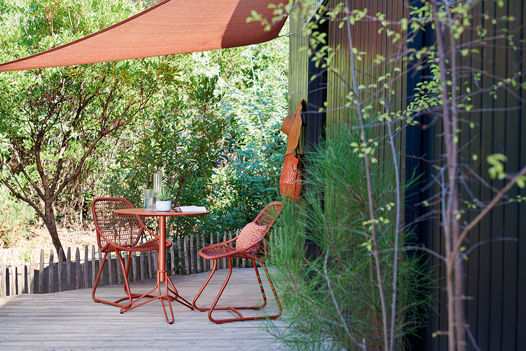 Sixties chairs and Flower table in Red Ochre