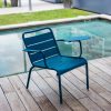 Luxembourg lounge armchair in Acapulco Blue