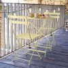 Bistro table 60 cm and Bistro metal chairs, all in Frosted Lemon