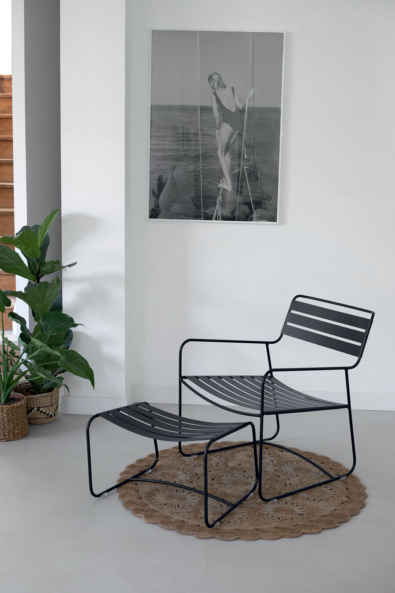 Surprising low armchair and Surprising footrest, both in Liquorice Surprising low armchair and Surprising footrest, both in Liquorice