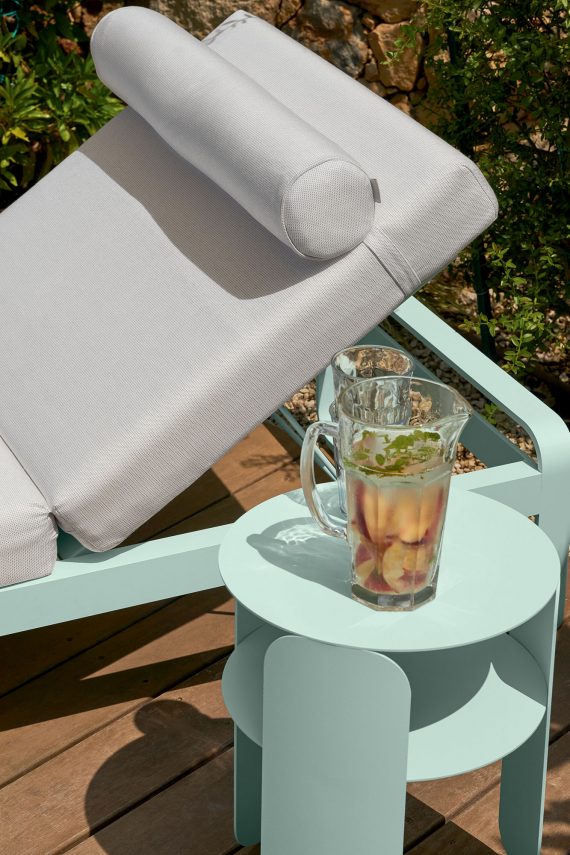 Bebop side table, 35 cm diameter, and Bellevie sun lounger, both in Iced Mint