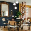 Studie oak chairs and armchairs and So'o table in Liquorice