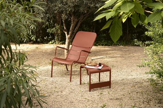 Luxembourg low armchair with headrest and Luxembourg low table/footrest in Red Ochre Stereo OTF